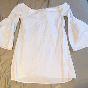 White bell sleeved dress
